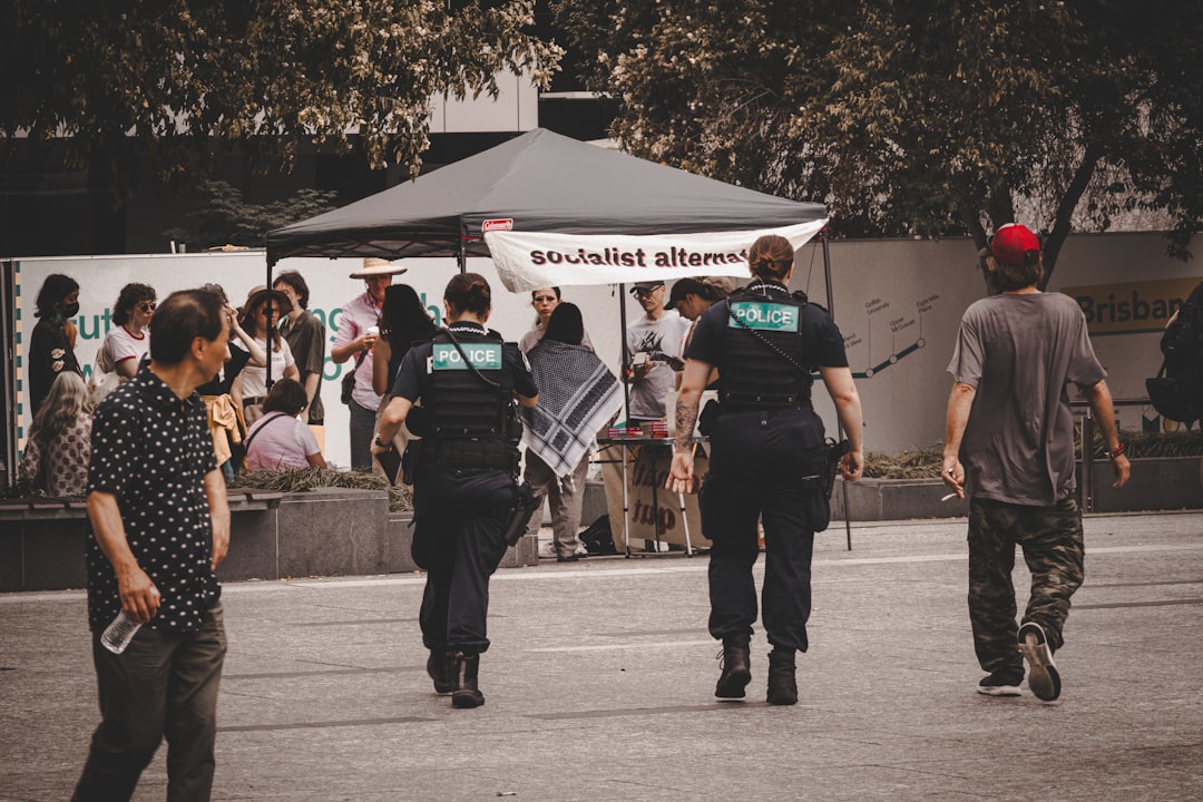 A police car parked outside the High West Saloon, with officers ensuring security