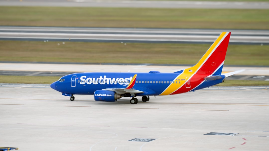 Passengers boarding a Southwest Airlines aircraft with new assigned seating
