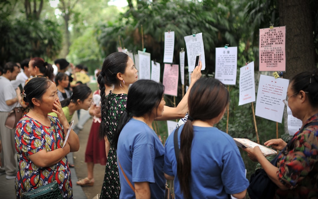 Teacher instructing students on AI programming