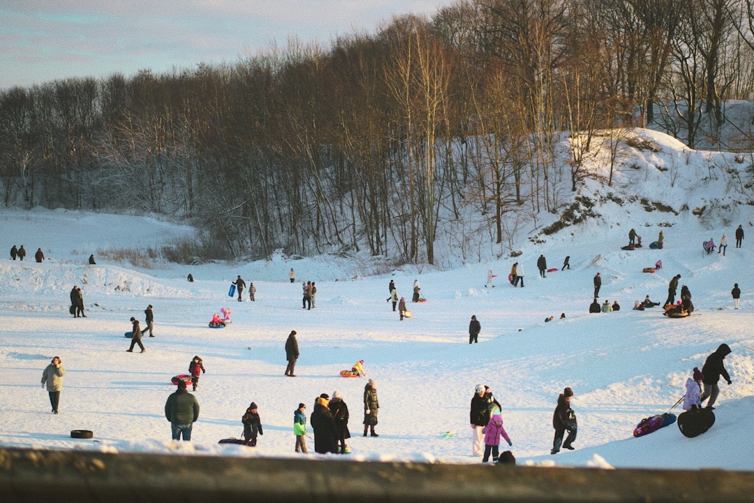 A family skiing on a snowy mountain