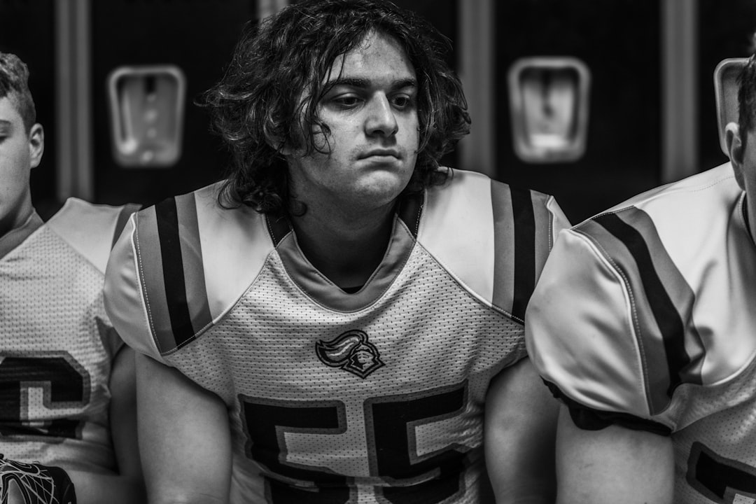 College football players signing NIL deals