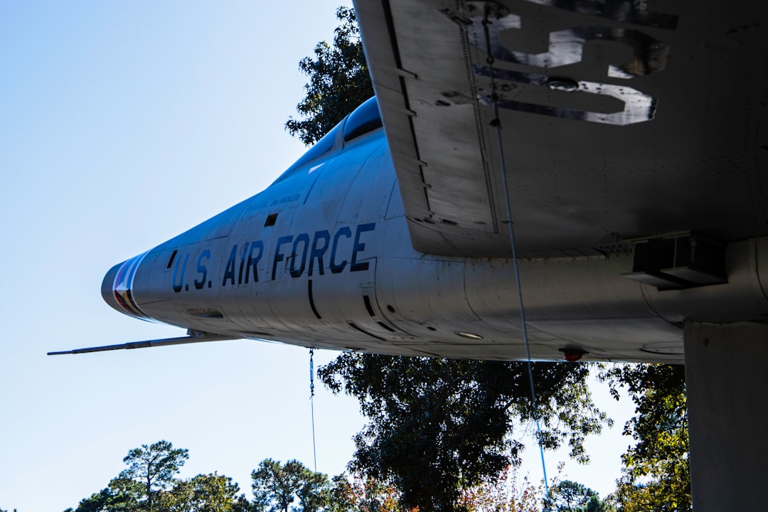 Air Force One taking off with blue skies in the background