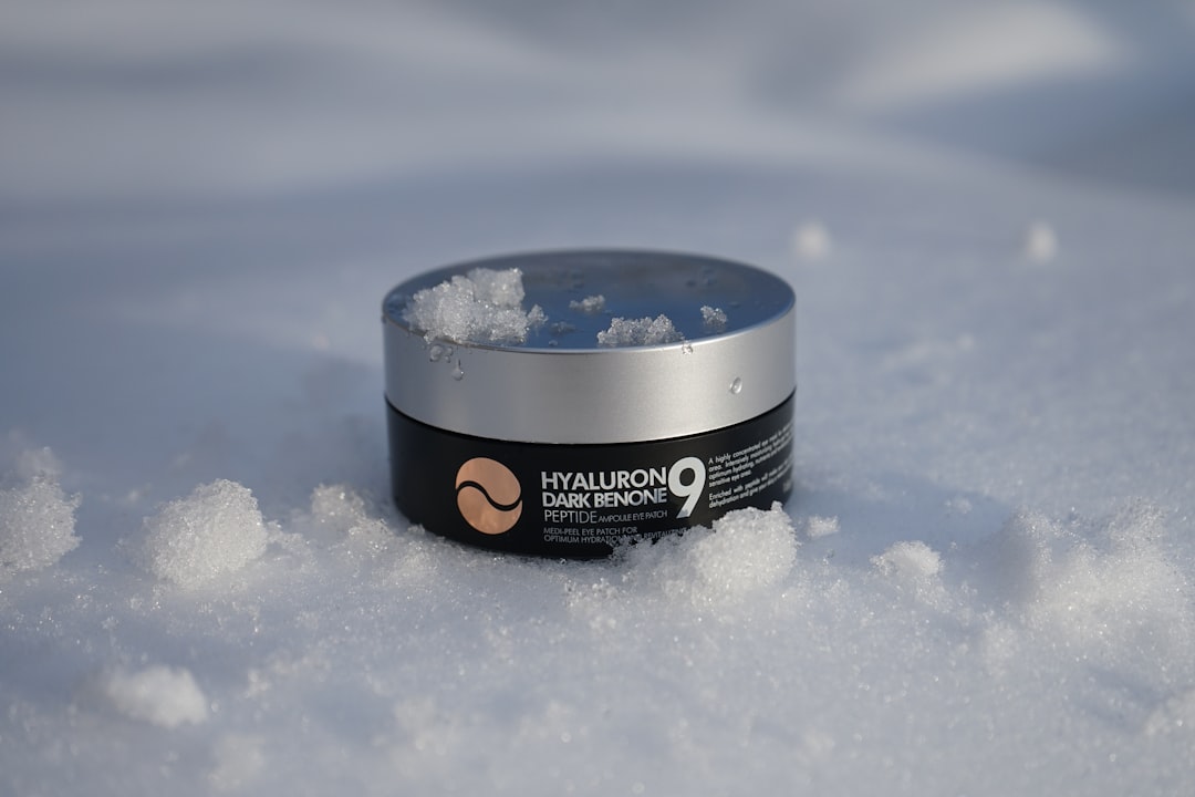 A jar of Cerave Moisturizing Cream on a bathroom counter