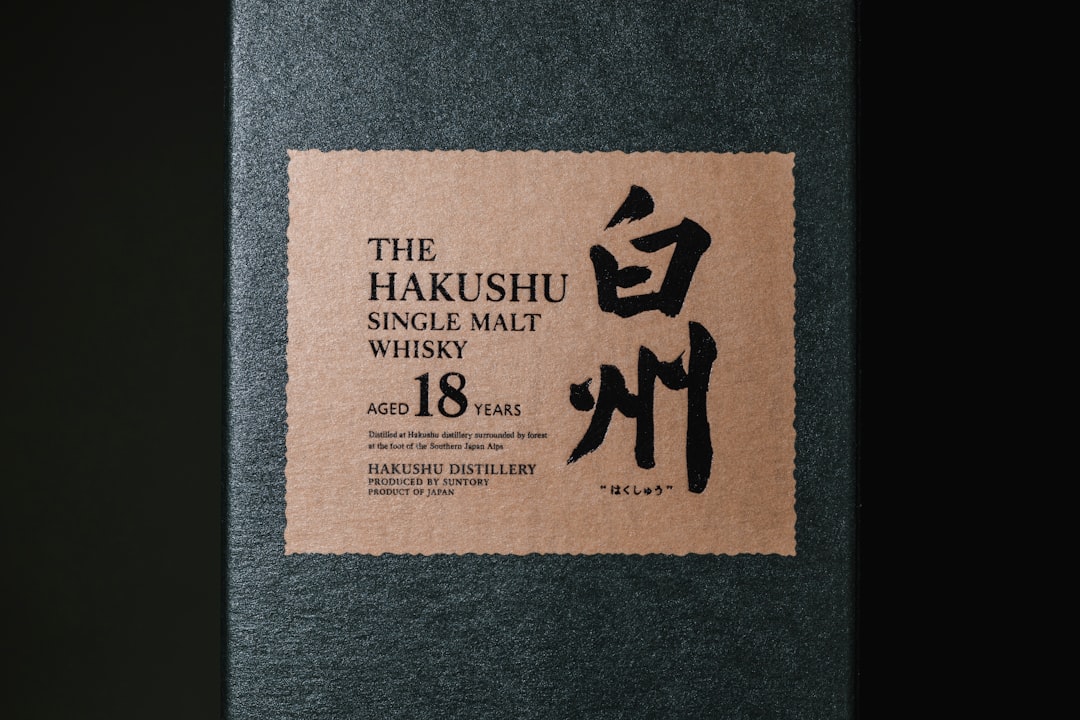 Shinsuke Nakamura and AJ Styles facing off in the ring