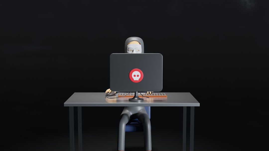 Cybersecurity professional working on a computer