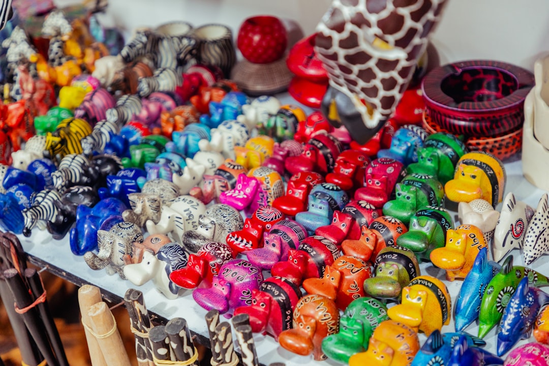 A collection of colorful lip balms arranged artistically