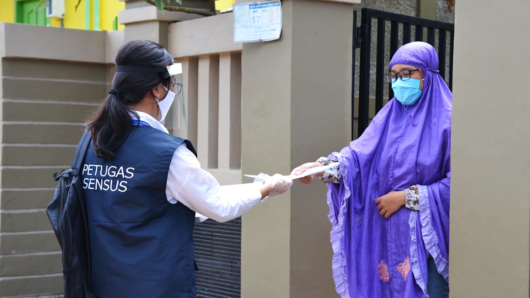 A healthcare worker administering a measles vaccine to a child