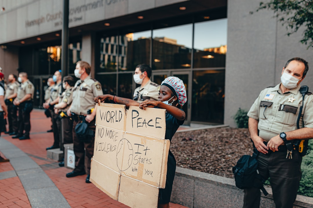 Protesters holding signs advocating for immigrants' rights