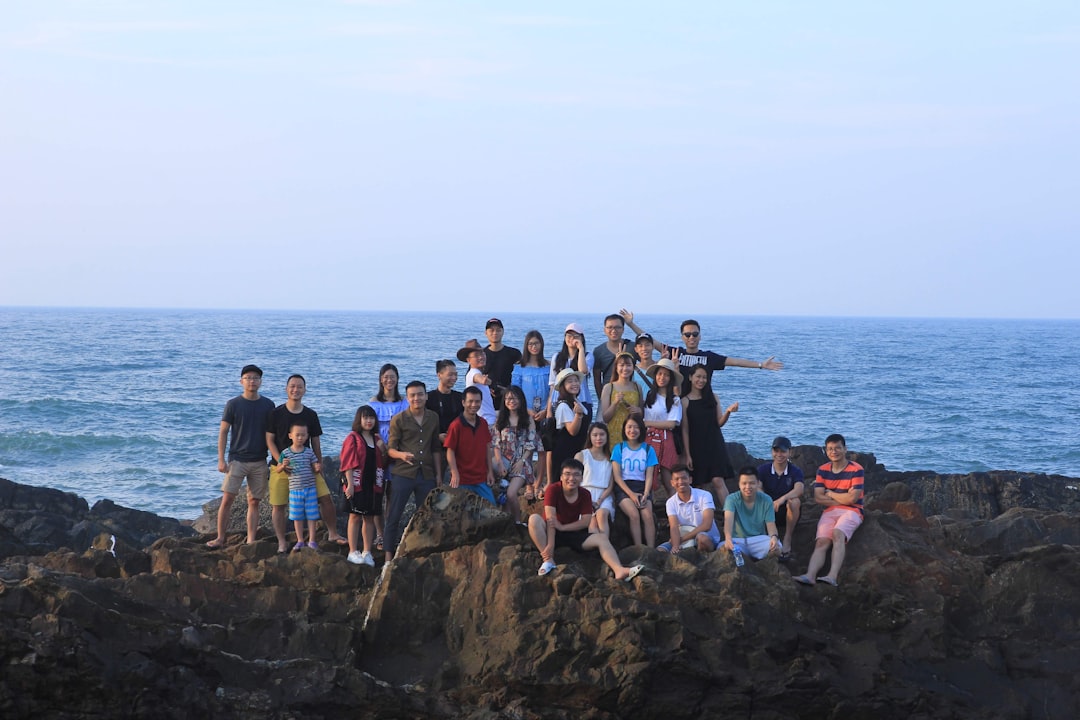 A group of friends enjoying a beach sunset