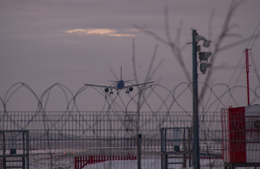 Snow-covered airport with grounded planes