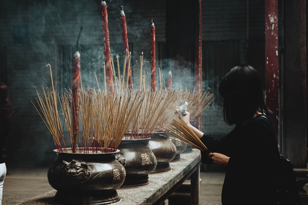 A chef preparing bamboo shoots in a kitchen
